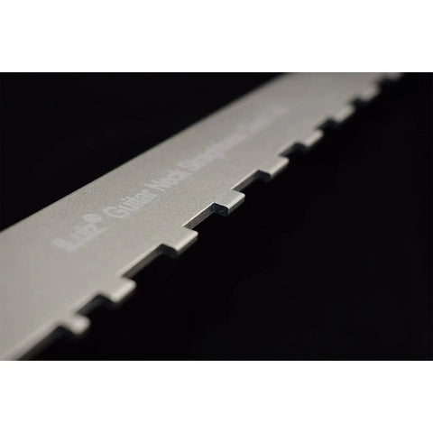 Close-up of Adjustable Notched Guitar Neck Straight Edge Tool For Fretboard Alignment showcasing the intricate notched design.