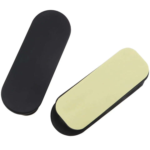 Two Six Black ABS Self Adhesive Pull Handles for cabinets, drawers, and furniture shown from an angled top view.