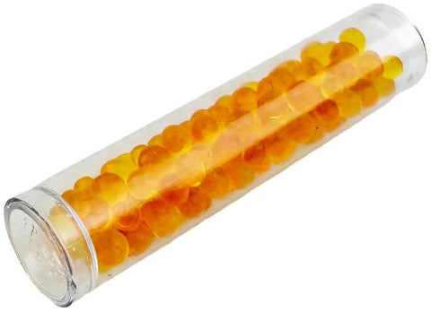 Clear tube containing orange Moisture Muncher Capsules For SportDiver Underwater Smartphone Housings And Reefmaster DC Housings Protect Lenses