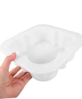 Person holding a white concrete paver mold for pathways and patios easy to use stepping stone molds for garden walkways borders driveways portable and versatile paving tool for DIY landscaping.
