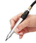 Close-up of hand holding Real Deal Air Scribe Engraving Pen With Pneumatic Pencil Design for etching.