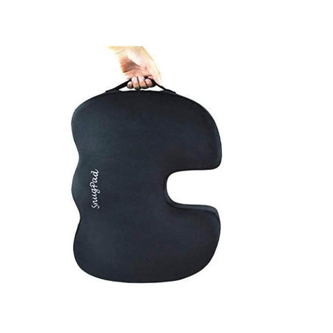 Upgraded Memory Foam Seat Cushion For Sciatica And Back Pain Relief, black coccyx support pillow being held by a hand.
