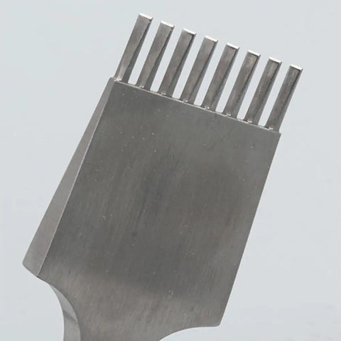 Close-up of Leather Pricking Iron Chisel In French Style Die Steel Punch Tool 3.85mm For Leathercraft Pros with 8 teeth.