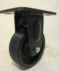 Badass 6 Inch Polyurethane Caster Pack Featuring 2 Swivel And 2 Rigid Drop Forged Kingpinless Build, close-up of a rigid caster.