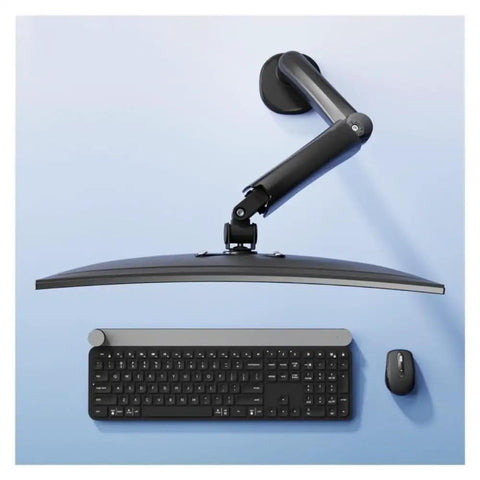 Rock Solid Single Monitor Desk Mount With Smooth Floating Arm Fits Up To 32 Inch Screens Holds 4.4 To 19.8 Lbs above a keyboard and mouse.