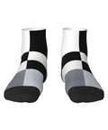 Black And White Checkerboard Straight Tube Socks Crafted From Buttery Soft Polyester For Elite Breathability And Quick Dry Comfort A Dead Set Classic For The Daily Grind Or Weekend Chill Sessions, view from the front.