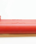 Red Adhesive Cartridge Holder HIT-CR-500 For HDM Manual Dispenser Heavy Duty Clip With Secure Fit lying flat on white surface
