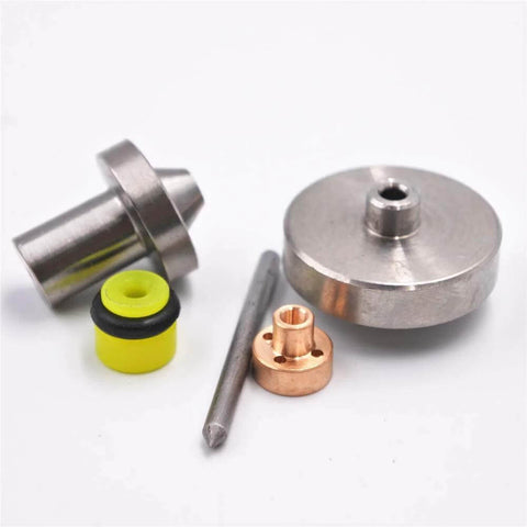 Seal kit for waterjet cutting machine; yellow rubber seal, copper fittings, and metal discs.