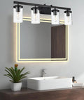 Modern 3 Light Vanity Lighting Fixture In Brushed Nickel With Clear Glass Shades over bathroom mirror