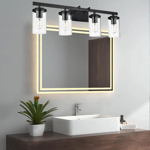 Brushed Brass 5 Light Farmhouse Vanity Lights with Clear Glass Shades installed above bathroom mirror, modern wall sconce.