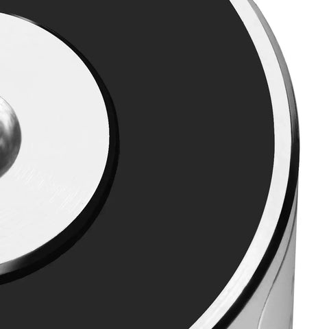 Close-up of 12V DC Electric Lifting Magnet Electromagnet Solenoid For Assembly Line Use, sleek silver tone exterior, compact design