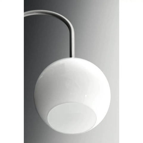 Close-up of glossy white globe on Carisa Three Light Chandelier In Brushed Nickel Finish With Glossy White Glass Globes For Modern Living And Dining Rooms Mid Century Revival Style For Home Decor