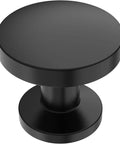 Rock Sick Matte Black Cabinet Knobs, 30-Pack Solid Round Designs For Kitchen And Closet Glow Up. Close-up of matte black round cabinet knob.