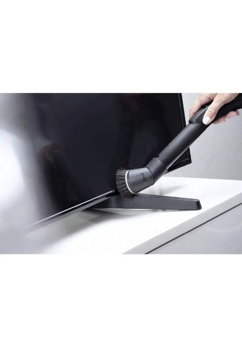 Using Attachable Dusting Brush For Vacuum Cleaners With Flexible Swivel Joint Pro Grade Furniture Care on TV stand surface