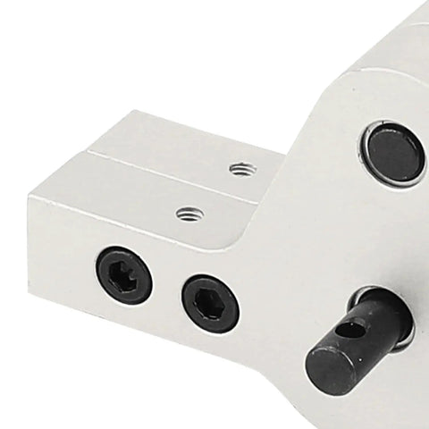 Close-up of CNC Aluminum D90 Transfer Case Gearbox for One Tenth Scale RC Crawler with visible mounting holes and shaft