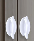 Four Pack Peel And Stick Drawer Pulls Easy Grip Handles For Cabinets And Doors No Glue Needed Self Adhesive White 1.9 By 3.2 Inches Fits Glass Tile Stainless Steel Wood Surfaces. White ABS self-adhesive drawer pulls on cabinet doors