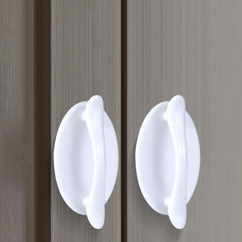 Four Pack Peel And Stick Drawer Pulls Easy Grip Handles For Cabinets And Doors No Glue Needed Self Adhesive White 1.9 By 3.2 Inches Fits Glass Tile Stainless Steel Wood Surfaces. White ABS self-adhesive drawer pulls on cabinet doors