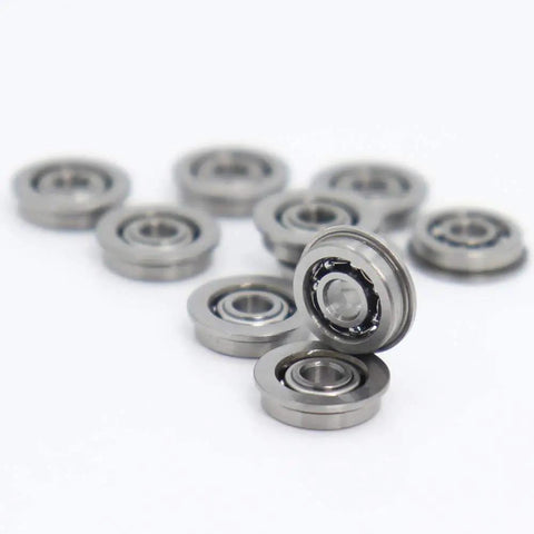 Get Your Hands On 10 Pc MF93 Flanged Ball Bearings For Mini Gearheads With 3mm Bore And 9mm Outer Diameter ABEC 3 Grade Open Design Perfect For High Speed DIY Projects And Industrial Gears Using Top Chrome Steel showing a close-up of chrome steel bearings.