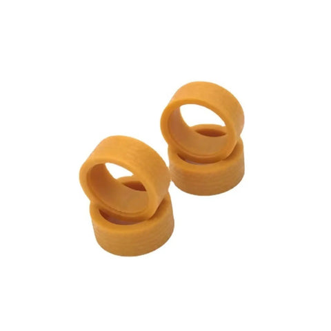RC Wheel Upgrade Kit for 1 By 28 Scale Cars yellow tire skin rubber construction, visible stack of tire skins.
