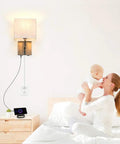 Bedside Wall Mount Lamp With Dimmer Switch And Dual USB Ports, Linen Fabric Shade Wall Sconce in bedroom with mother and child