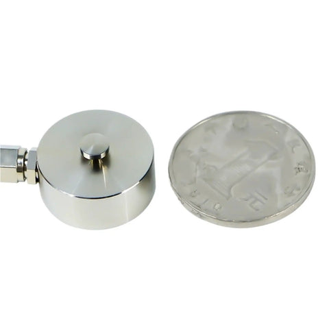 Tiny DYHW-120 Load Cell Sensor For Precision Weight And Force Measurement Testing next to a coin for size comparison.