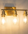 Three-Light Vanity Light With Clear Glass Shades In Brushed Brass Finish Wall Sconce For Bathroom Hallway And Living Areas Modern Farmhouse Style Vibe Easy Install Durable Metal Construction