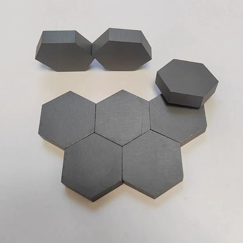 Hexagonal Ceramic Sheet B4C Insulating Plates for Lab Use, Heavy Duty Heat Resistant Up To 2000°C, arranged on a surface