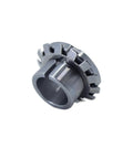 Adapter sleeve for bearings, gray metal with external notches, hollow cylindrical bore, front view.