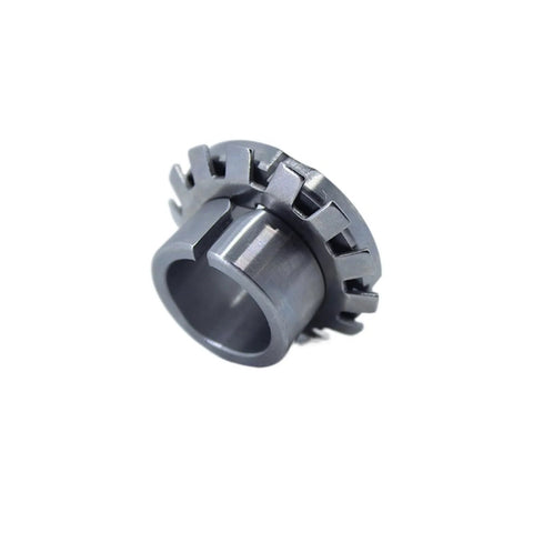 Adapter sleeve for bearings, gray metal with external notches, hollow cylindrical bore, front view.