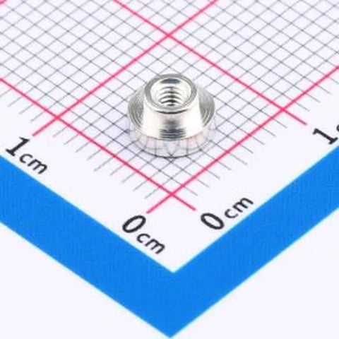 20 Piece Heavy Duty Surface Mount Round Nut Columns M2x1.5 PCB Connectors Tinned Copper Electronics Hardware on grid paper.