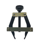 Front view of chain puller tool for roller chains; black arms, brass clamp, screw adjuster.