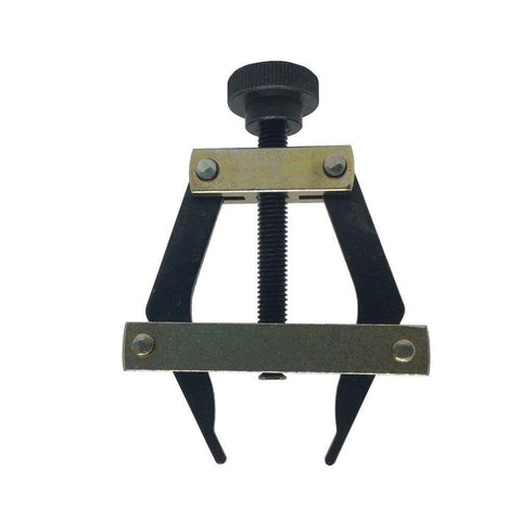 Front view of chain puller tool for roller chains; black arms, brass clamp, screw adjuster.