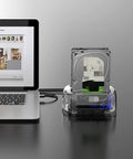 Heavy Duty Dual Bay External Hard Drive Enclosure Type C To Sata 3.1 accepts 2.5 and 3.5 inch drives in white housing connected to laptop.