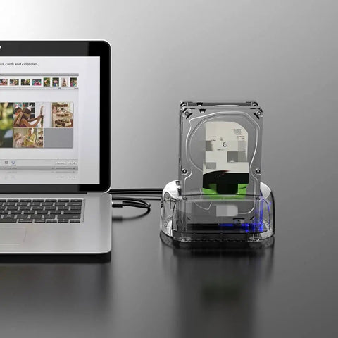 Heavy Duty Dual Bay External Hard Drive Enclosure Type C To Sata 3.1 accepts 2.5 and 3.5 inch drives in white housing connected to laptop.