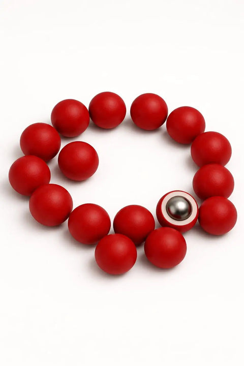 ABS Coated Steel Balls Set 17.25mm Red 10g Core With Nylon Steel Build, 0.68 Inch Precision Spheres, 40 Pack For Bearings, Hobby Machining, And High Durability In Tough DIY Projects. red ABS-coated steel balls arranged in a circle, one cutaway showing the steel core