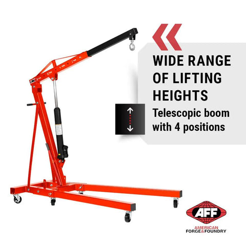 Rock Solid Two Ton Folding Engine Crane For Heavy Duty Garage Days with telescopic boom and swivel wheels for easy lifting.