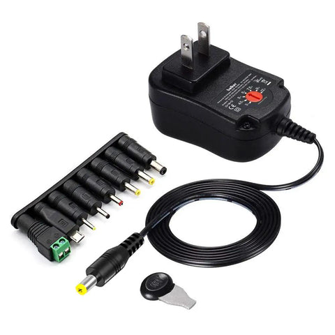 Versatile 12W Universal ACDC Power Adapter With Eight Tip Sizes, Adjustable 3V to 12V DC Output, 1000mA Max, Micro USB Port shown