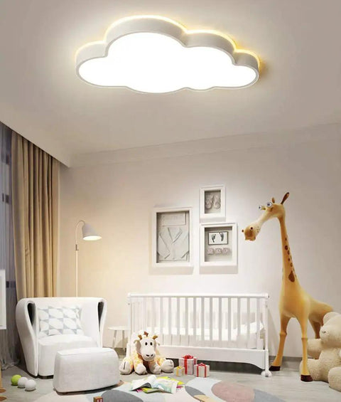 Cloud Shape LED Ceiling Light For Kids Room Acrylic Flush Mount Chandelier With Remote Dimmable Warm And White Light Large 25.5 Inch By 16 Inch Kids Bedroom Nursery Living Room Decor in a nursery setting.