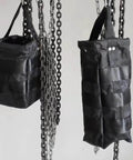 Durable Nylon Chain Container Bag For 1 Ton Manual Hoist hanging, highlighting large capacity and secure chain protection features.