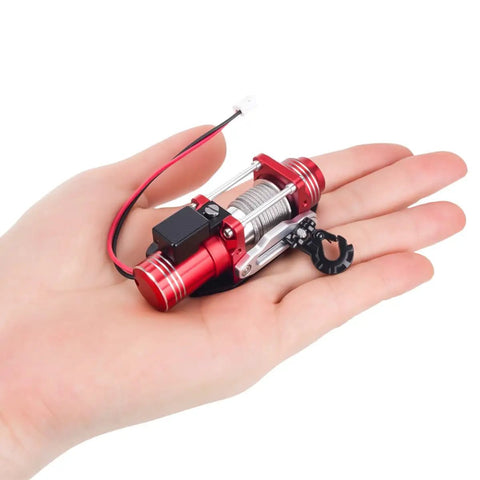 Sick Simulated Electric Winch Made From CNC Aluminum Alloy For 1 10 Rc Crawler Upgrade Parts With Realistic Red Finish in hand.