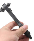 Versatile 2-In-1 Drill Chuck Key With Integrated Ratchet And 12.5Mm Square Drive Socket Wrench For Lightning Fast Bit Swaps and Effortless Forward Reverse Switching Without Breaking A Sweat Black Finish held in hand.