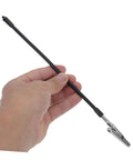 Hand holding flexible arm from Six Piece Flexible Soldering Alligator Clamps With Third Hand Tool And Magnifying Lamp for PCB work.