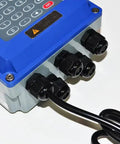 Close-up view of Digital Ultrasonic Flow Meter For Liquids TUF-2000B connections, showing bi-directional setup, IP67 casing.