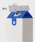 Jisader Two Pack Milk Carton Sealing Clips With Rotating Design For Boxed Drinks And Food Bags on a milk carton.