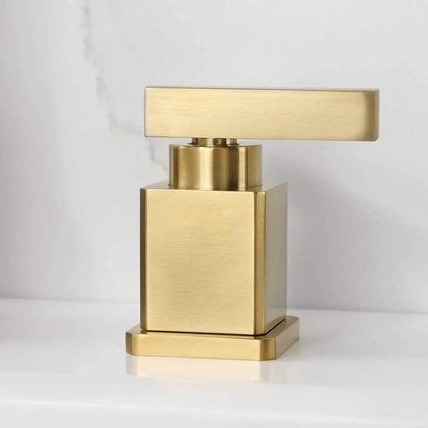 Brushed Gold Two-Handle Bathroom Faucet, 8-Inch Widespread 3-Hole Sink Fixture, showing one handle close-up with sleek design.
