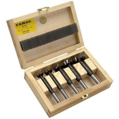 Hella Sharp Five Piece Forstner Drill Bit Set Covers 5 8 To 1 3 8 Inches in wooden crate, ideal for precise woodworking tasks.