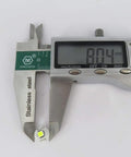 Caliper measuring 8mm base of a 10 Pack White T3 Neo Wedge 3030 LED Bulb for car dashboards and HVAC controls