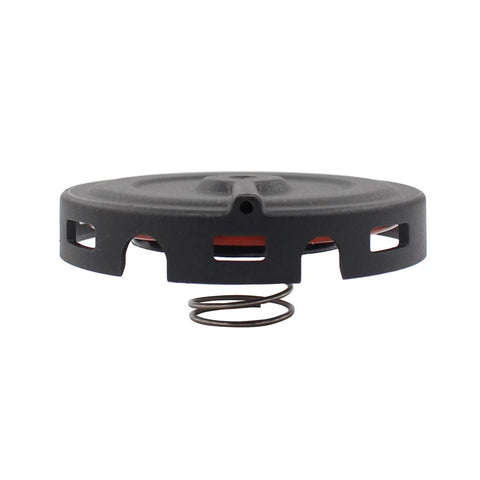 Front view of round black PCV valve diaphragm repair kit component with orange membrane and coil spring