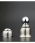 Stylish Stainless Steel Magnetic Door Stopper, two pieces with shiny finish, prevents door slamming for homes and offices.