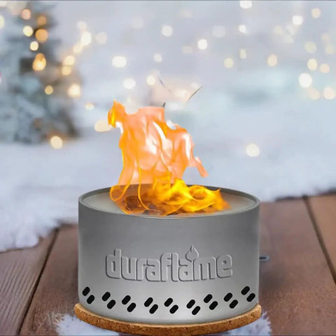 Tabletop Bonfire Fire Pit For Indoor Or Outdoor Use ultra lightweight kit with visible flames on a gray surface with coaster